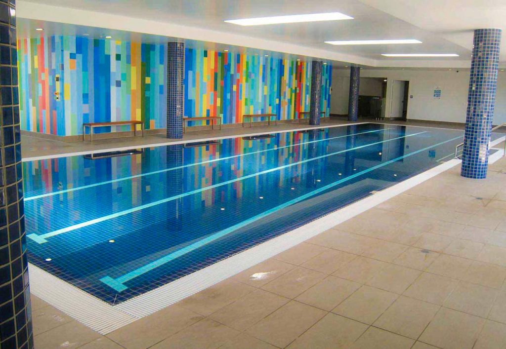Tiled indoor swimming pool at Pegasus apartments Broadbeach